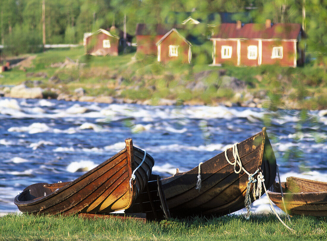 Wooden boats at Torne river by the Finnish border. Kukkola, Norrbotten, Sweden