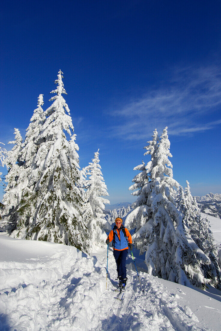 Backcountry skier ascending Spieser, Allgaeu Alps, Bavaria, Germany