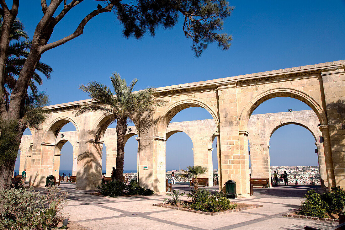 Arcades at the Lower Barracca Gardens under blue sky, Valletta, Malta, Europe