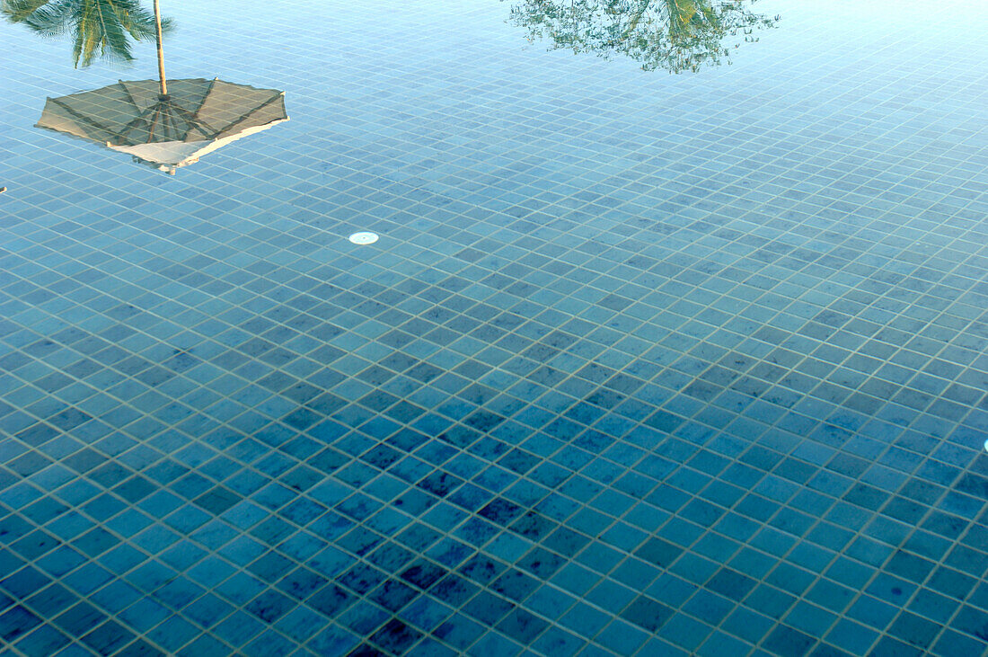 Reflection in hotel swimming pool, Kirimaya Design Hotel, Thailand