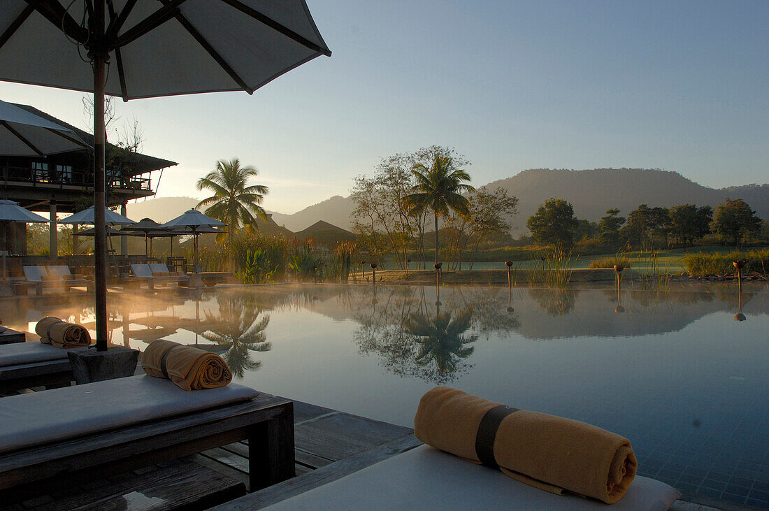 Pool at dust with view towards the golf course, Kirimaya Design Hotel, Thailand