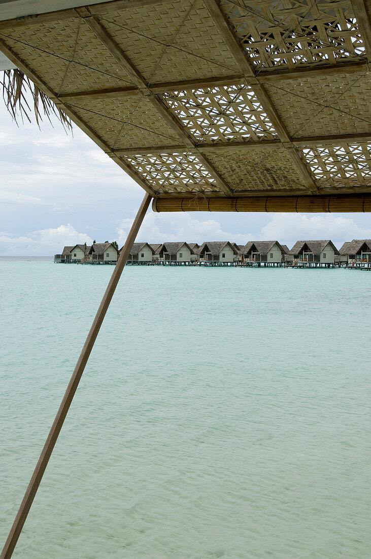 View from Blu Restaurant towards overwater villas, Four Seasons Resort Landaa Giraavaru, Maldives