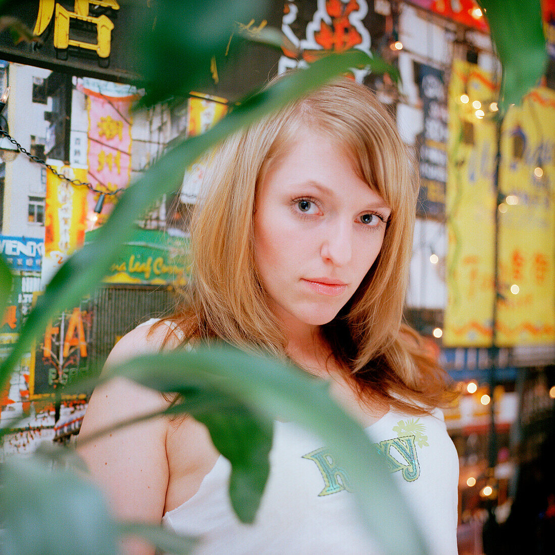 Young woman looking at camera, portrait