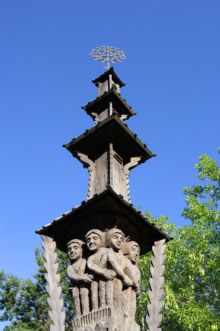 Carved wooden pole decorates farmhouses in the district of Druskininkai, Lithuania