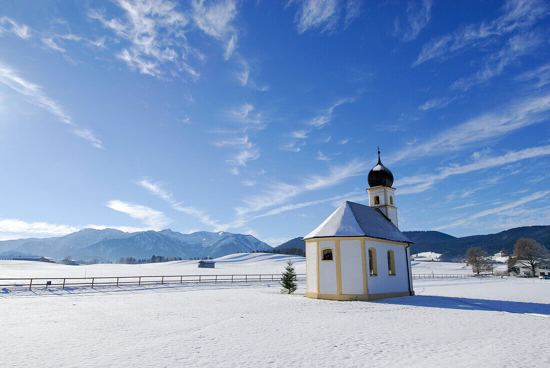 Chapel in winter near Hundham, Fischbachau, Upper Bavaria, Germany