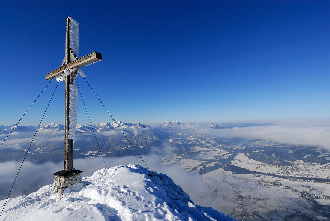 Cross on summit of Naunspitze, view to Bavarian foothills with Wendelstein, fog bank in the valley of river Inn, Naunspitze, Zahmer Kaiser, Kaiser range, Kufstein, Tyrol, Austria