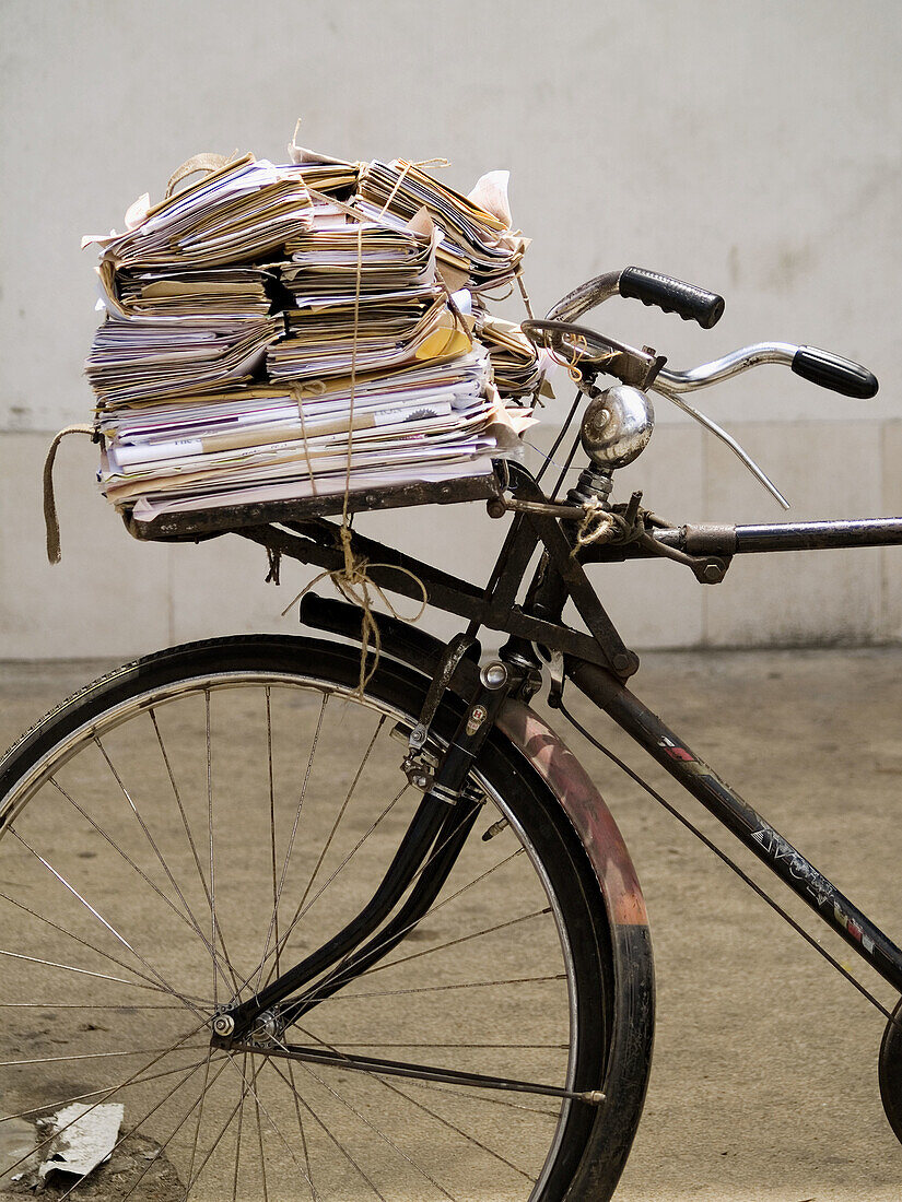 Mail carrier s bicycle filled with deliveries in Colombo, Sri Lanka