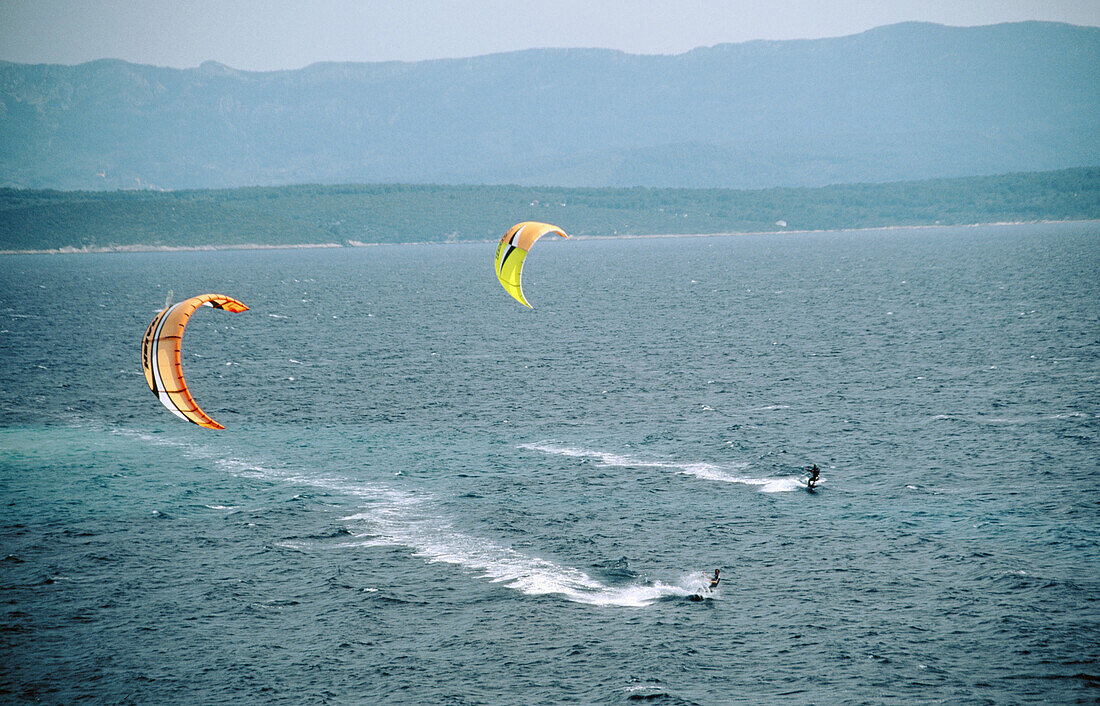 Kite surfers. Beach near Bol. Zlatni Rat (Golden Cape). Brac Island. Croatia