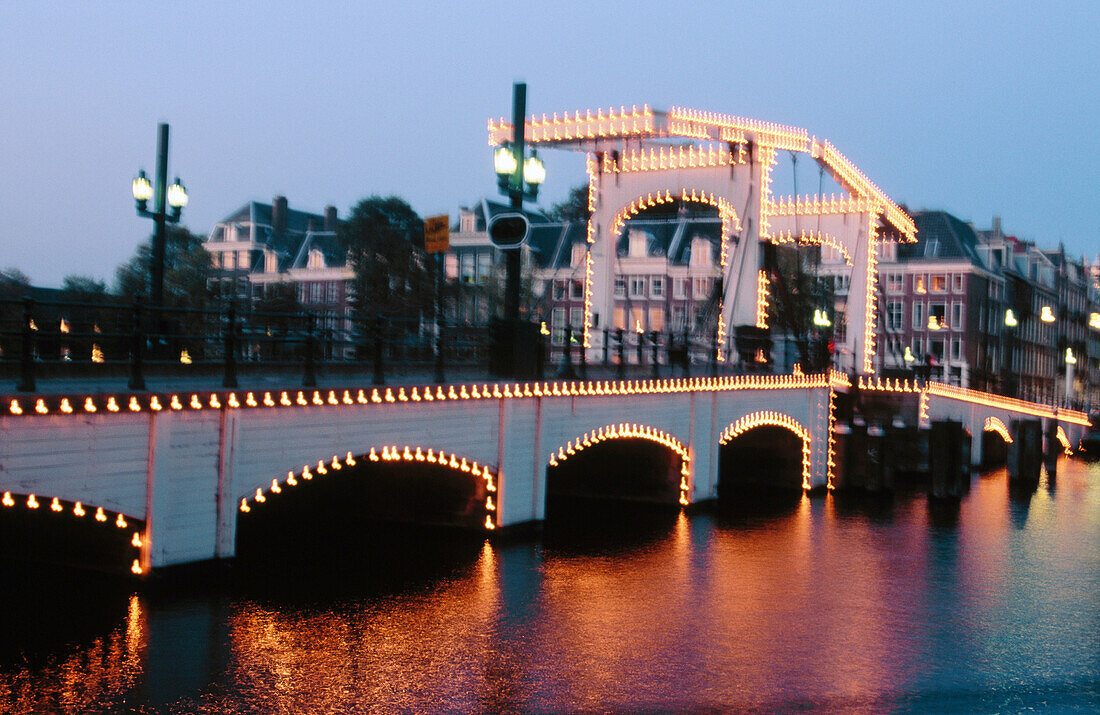 Magere Bridge at dusk. Amsterdam. Holland