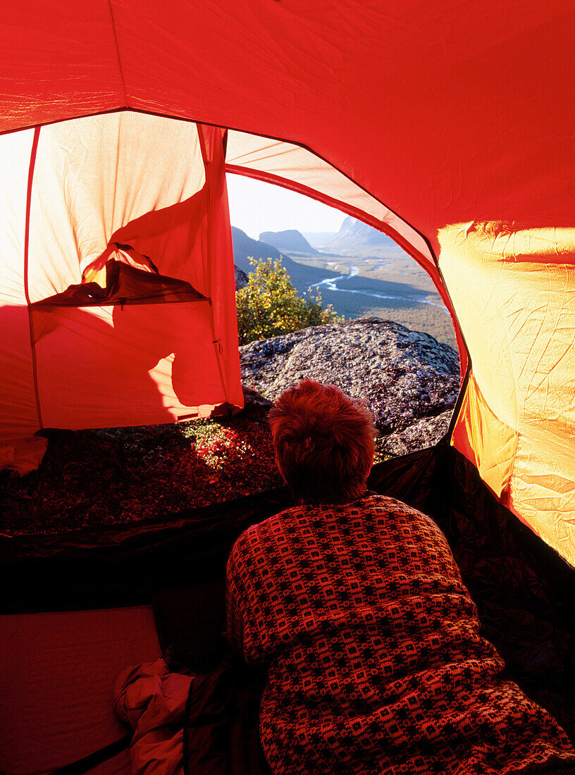 Man inside tent. Sarek National Park. Sweden