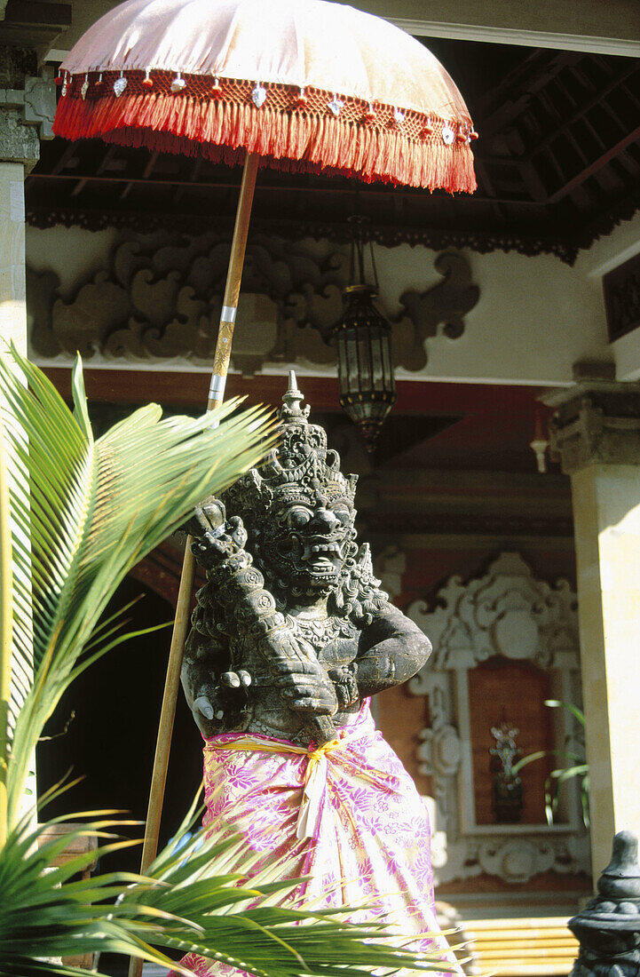  Art, Arts, Asia, Bali, Color, Colour, Daytime, Deities, Deity, Exterior, Figure, Figures, Holy, India, Outdoor, Outdoors, Outside, Parasol, Religion, Sculpture, Sculptures, Sunshade, Sunshades, Symbol, Symbols, Temple, Temples, Travel, Travels, Umbrella,