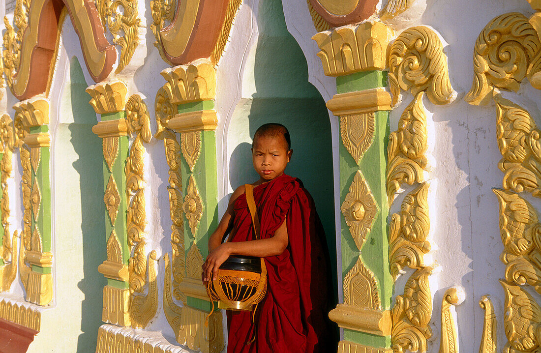 Novice monk at U-Min Thonze Pagoda. Sagaing. Mandalay. Myanmar (Burma).