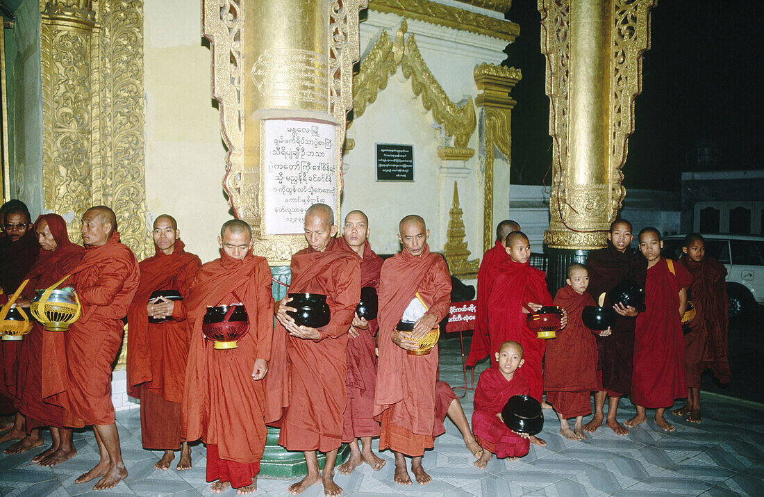 Monks at Maha Muni Pagoda. Mandalay. Myanmar (Burma).