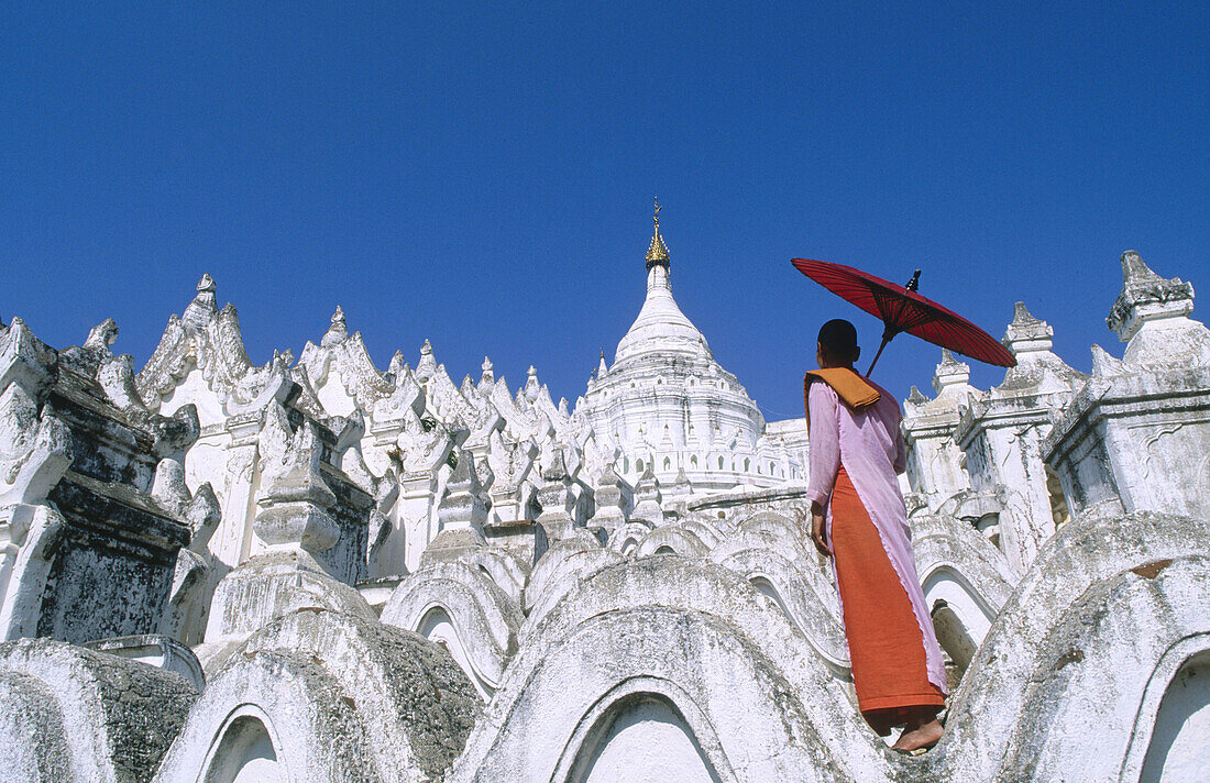 Nun in Hsinbyume Pagoda. Mandalay Division. Myanmar (Burma).