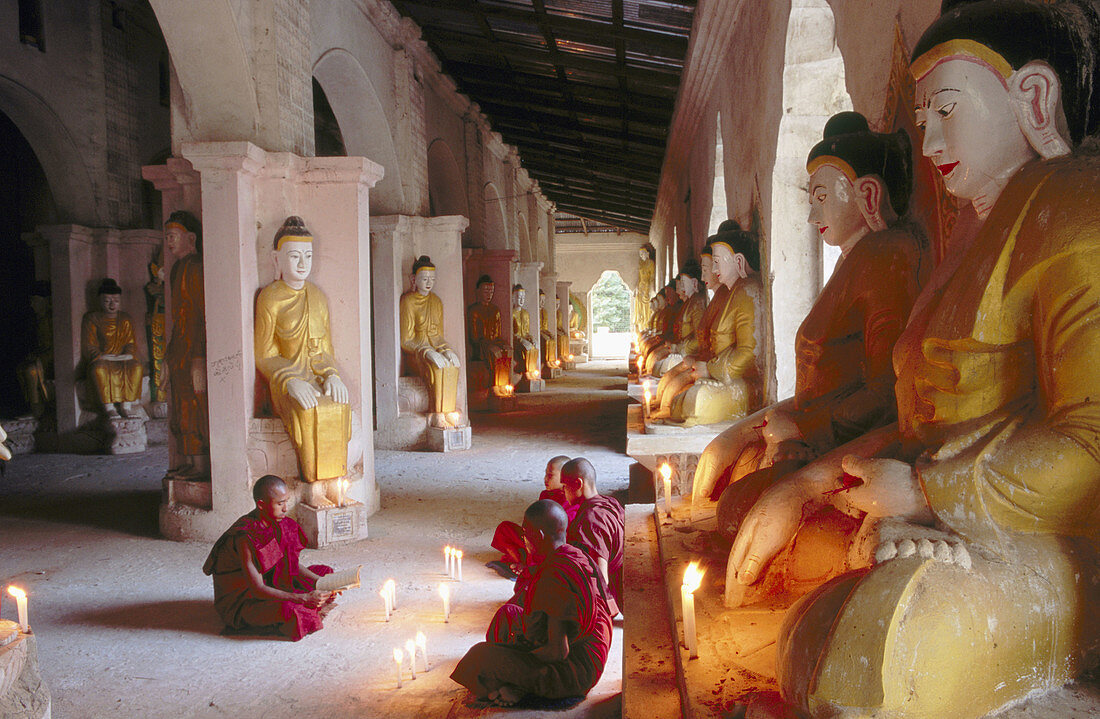 Monks in temple. Amarapura. Mandalay. Myanmar (Burma).