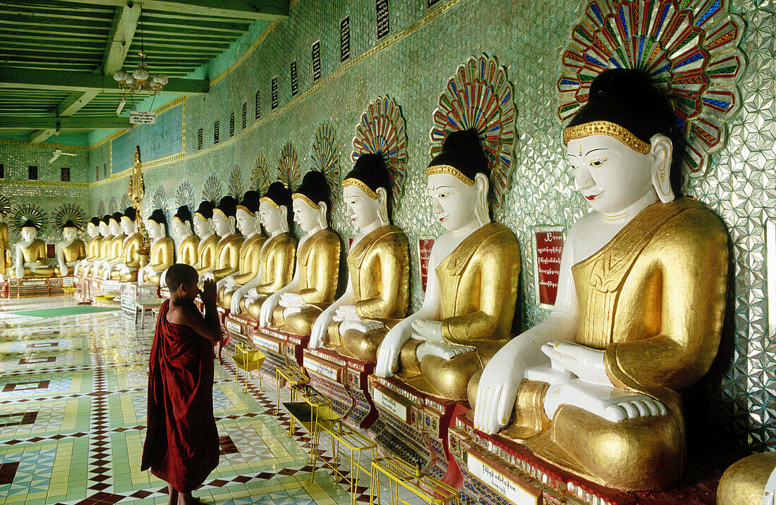 Novice monk at U-Min Thonze Pagoda. Sagaing. Mandalay. Myanmar (Burma).