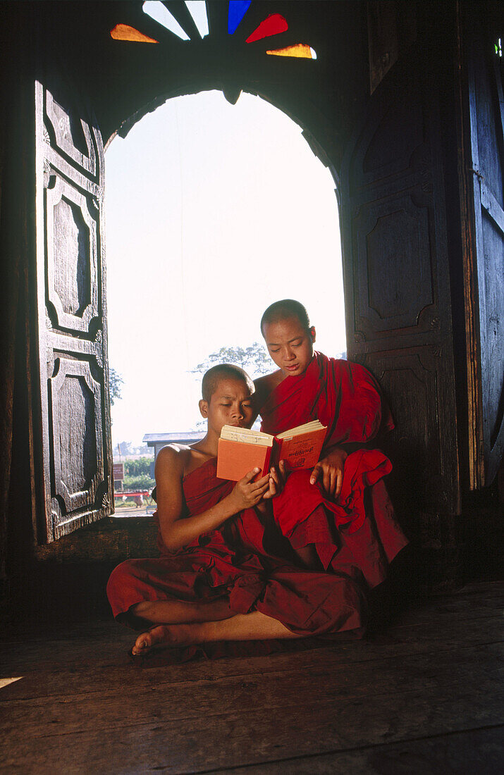 Monks in wood monastery. Inle Lake. Shan State. Myanmar.