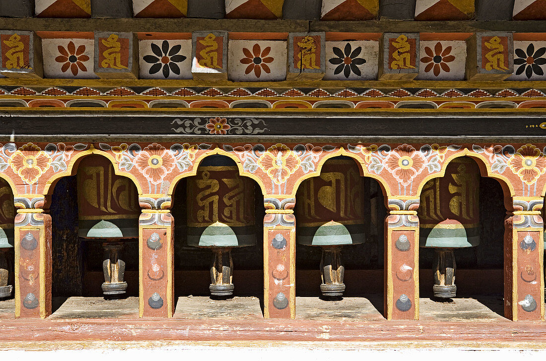 Bhutan. Paro. Paro Dzong Monastery. Buddhist Prayer wheels.