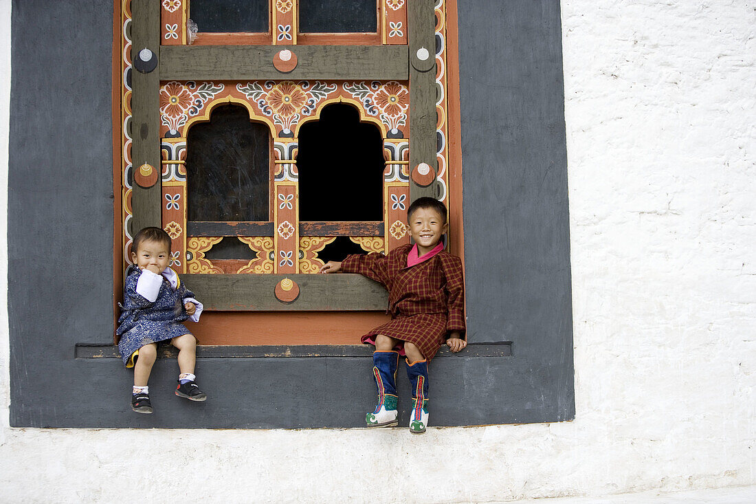 Bhutan. Thimpu. Thimpu Dzong Monastery. Buddhist Festival (Tsechu). Bhutanese little boys.