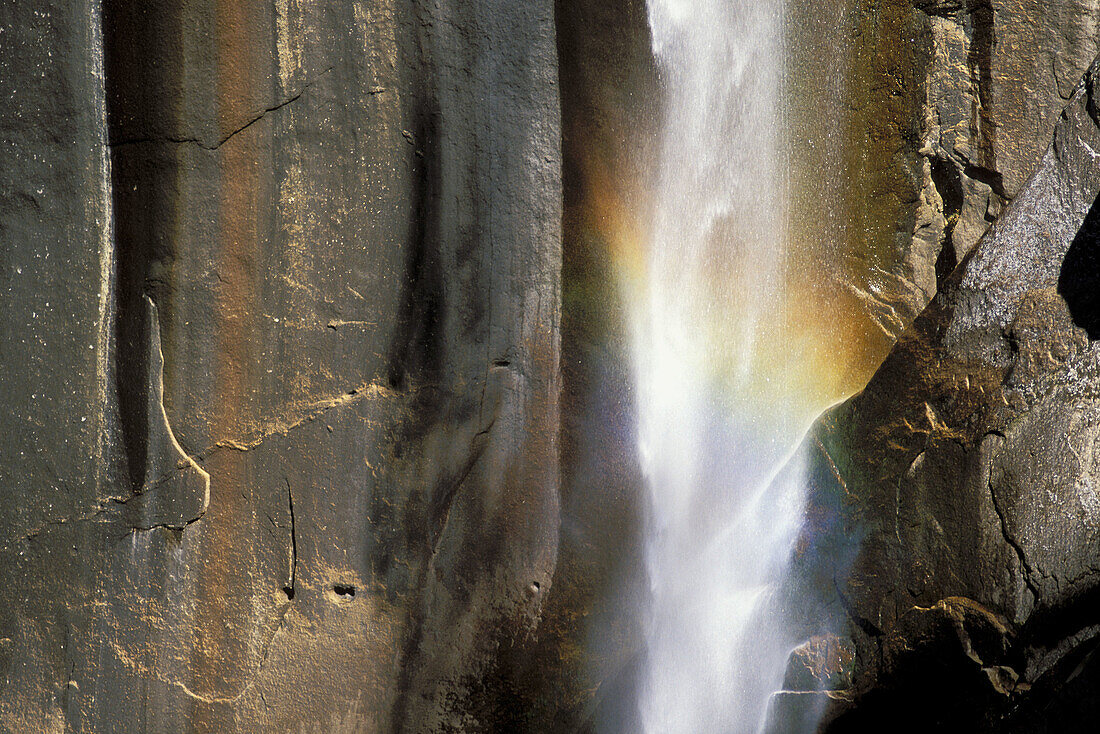 Detail of rainbow at the base of Vernal Falls. Yosemite National Park. California. USA