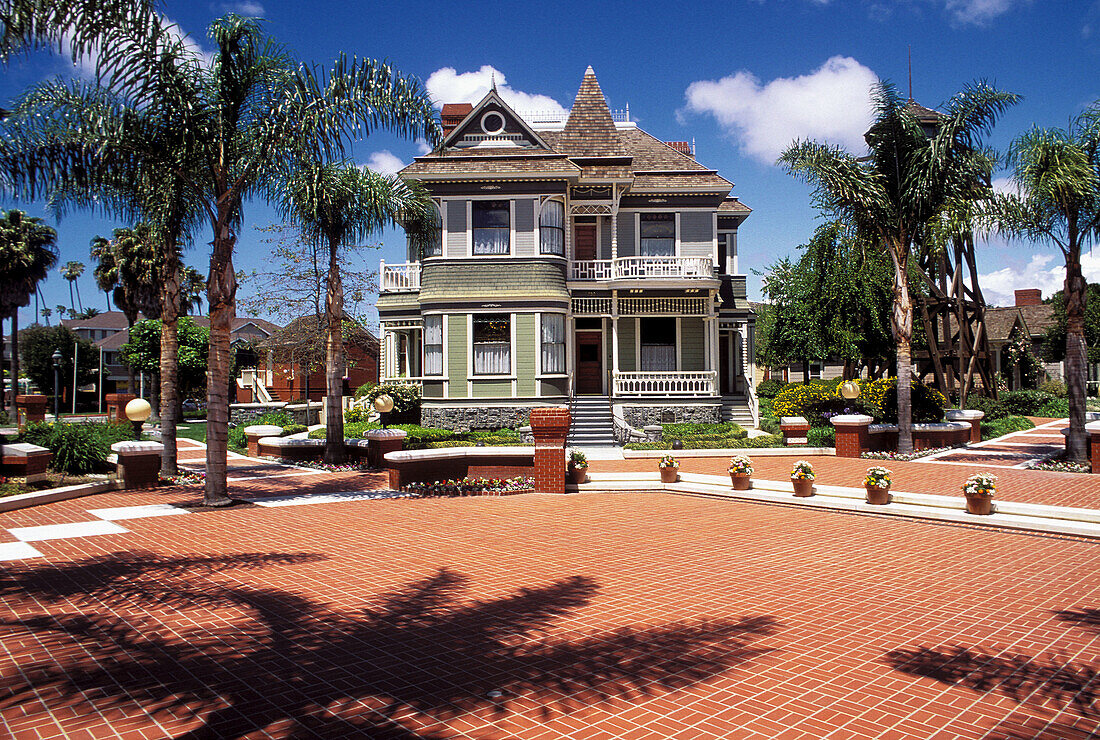 The Justin Petit Ranch House and red brick courtyard in Heritage Square, Oxnard, California
