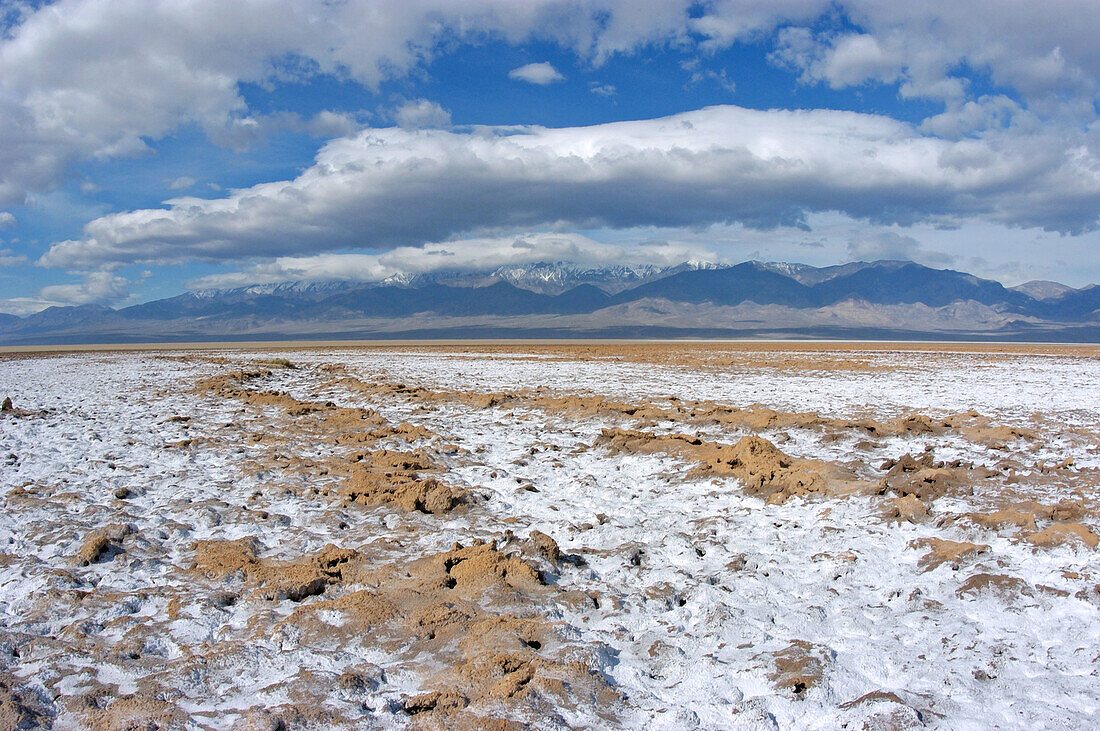 Salt pan under snow-covered Telescope Peak, Death Valley National Park, California