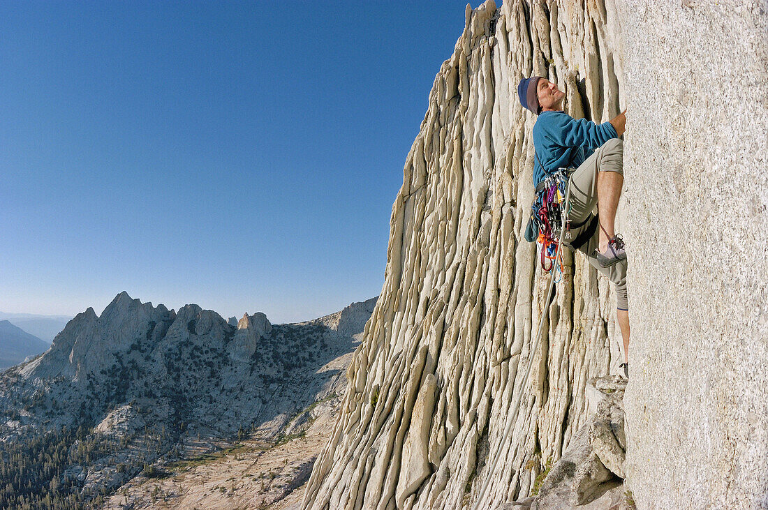 Climber leading up the north summit on Matthes Crest, Yosemite National Park, California