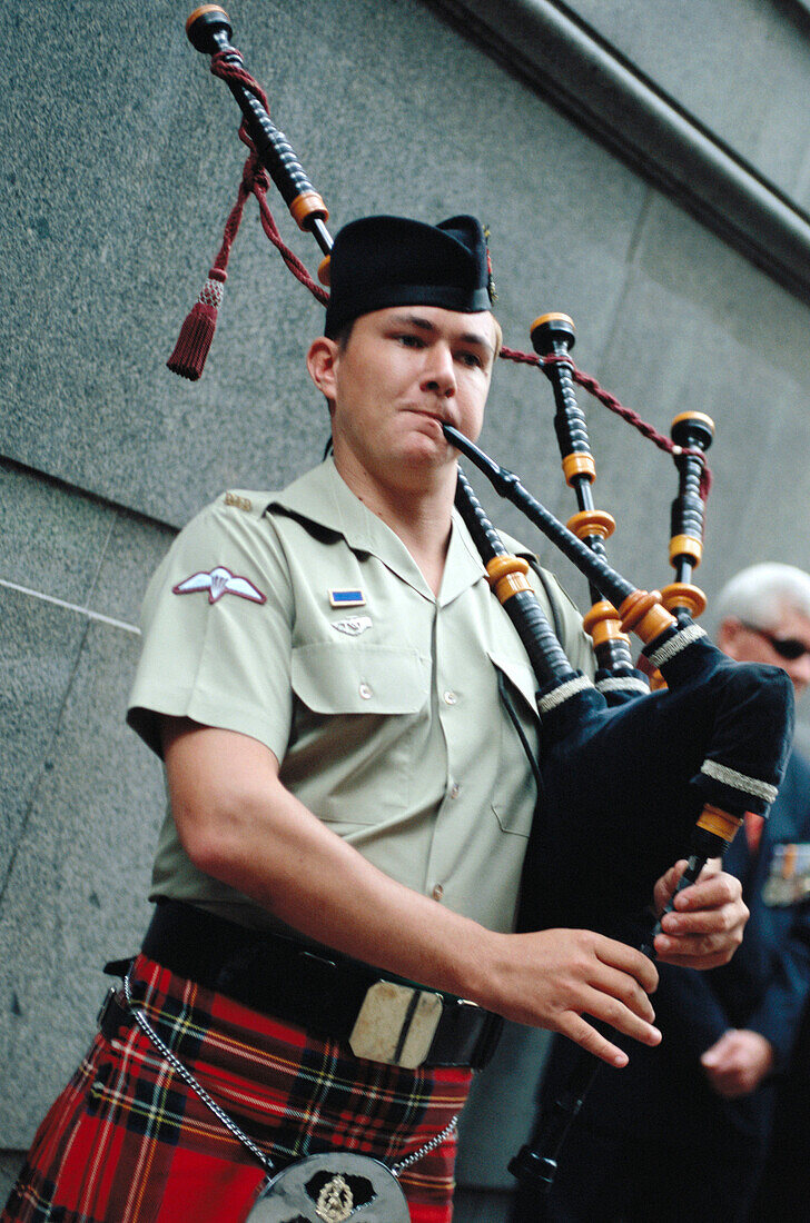 Man playing bagpipe