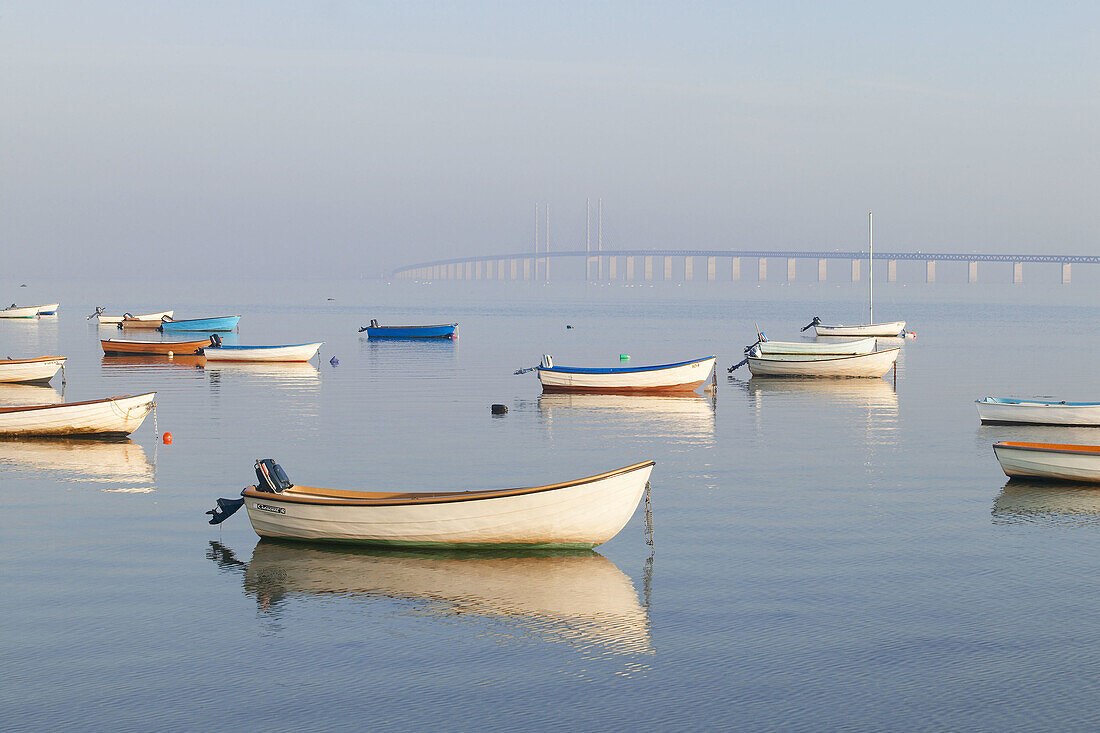 Small boats beside the Öresund bridge wich connects Denmark and Sweden