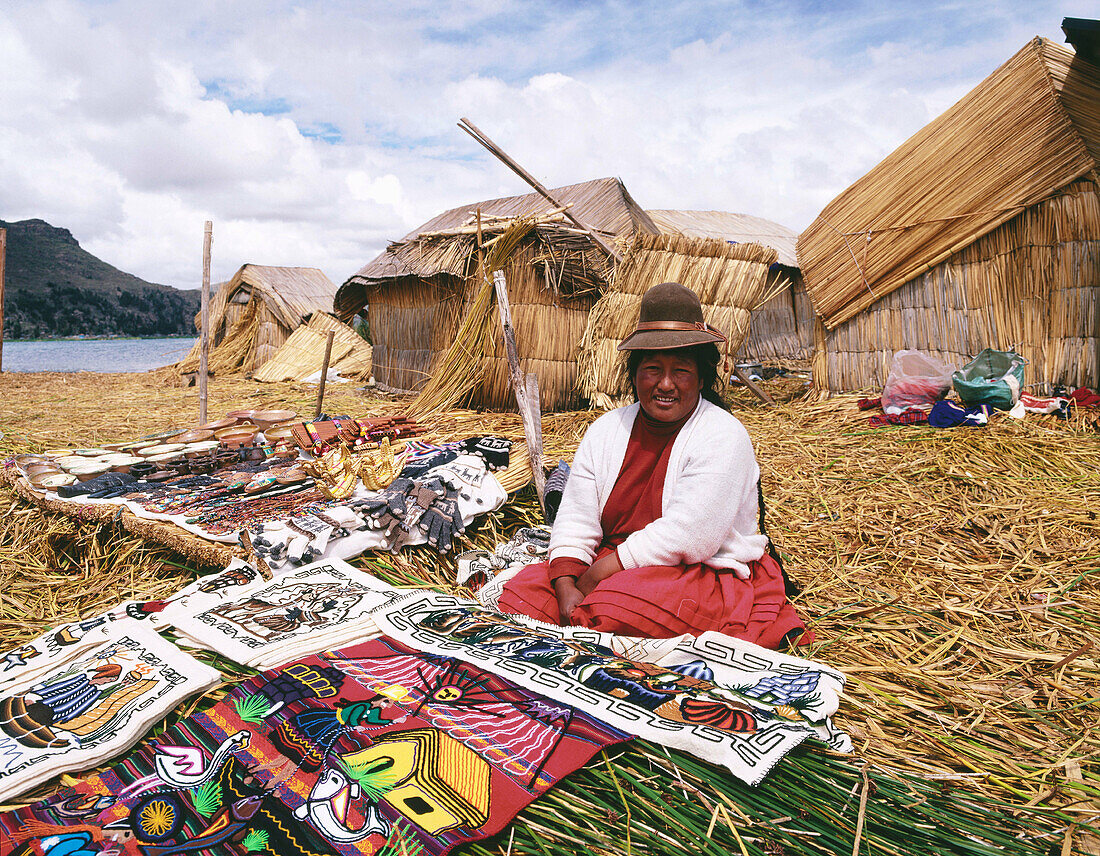 Uru indian woman selling textiles. Titicaca Lake. Peru