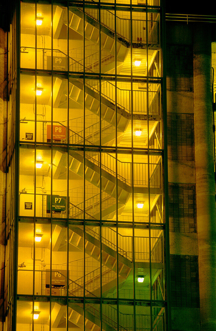 Outside staircases from a building at night