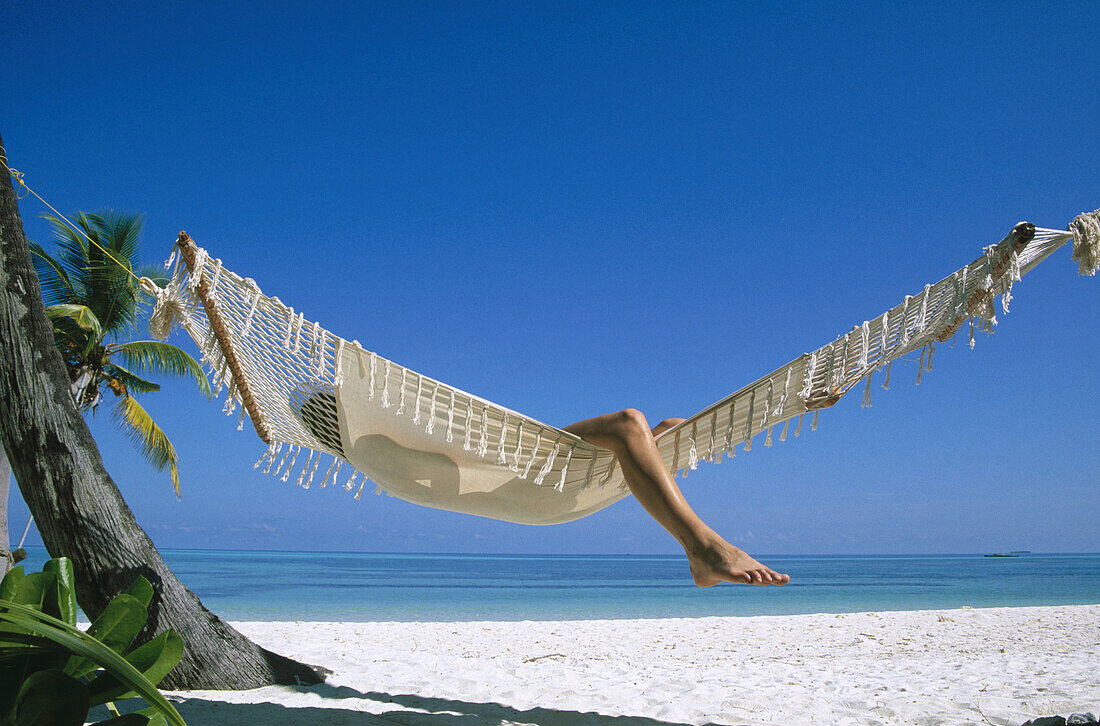 Woman on a beach. White Sands Resort and Spa. Ari Atoll. Maldives