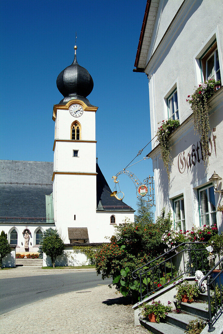 Church and inn in Truchtlaching. Chiemgau, Bavaria. Germany