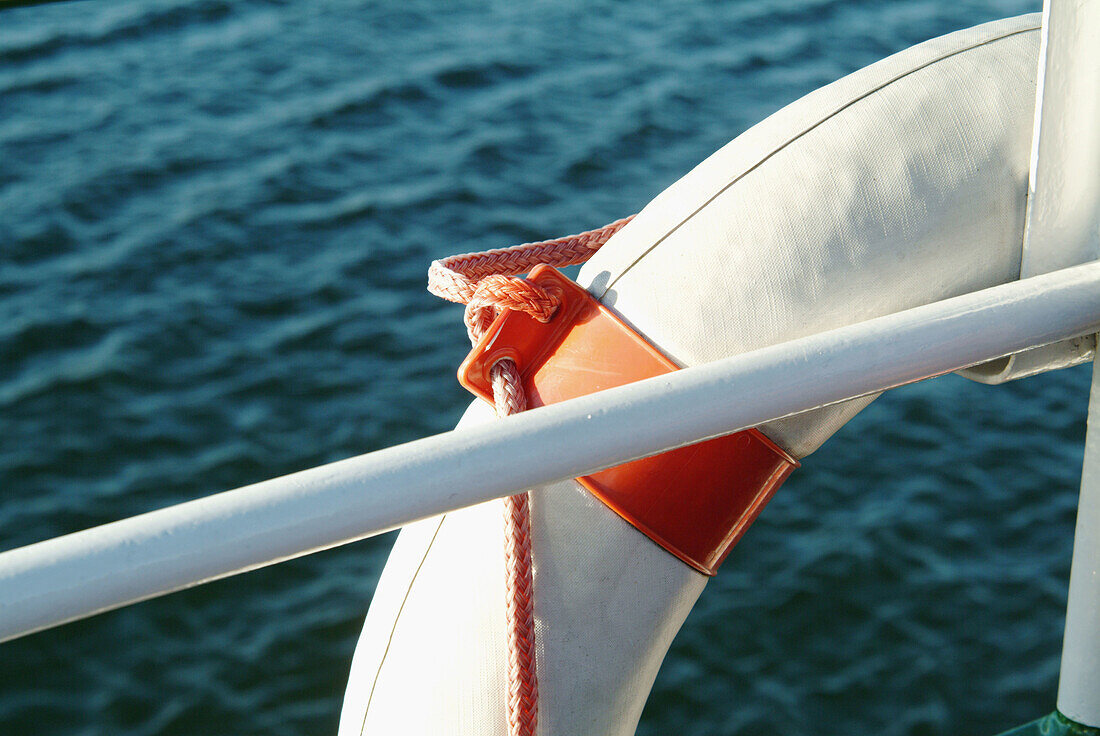 Life-belt on a Ferry (Weisse Flotte) on Chiemsee. Chiemgau. Bavaria. Germany