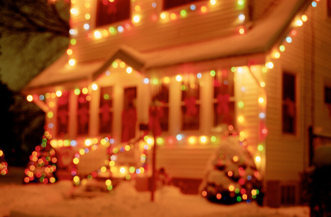 House with stringed Christmas lights
