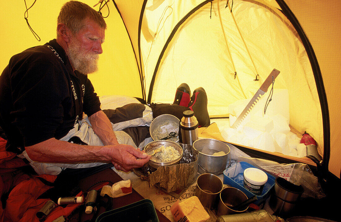 Cooking inside tent. Denali National Park. Alaska. USA