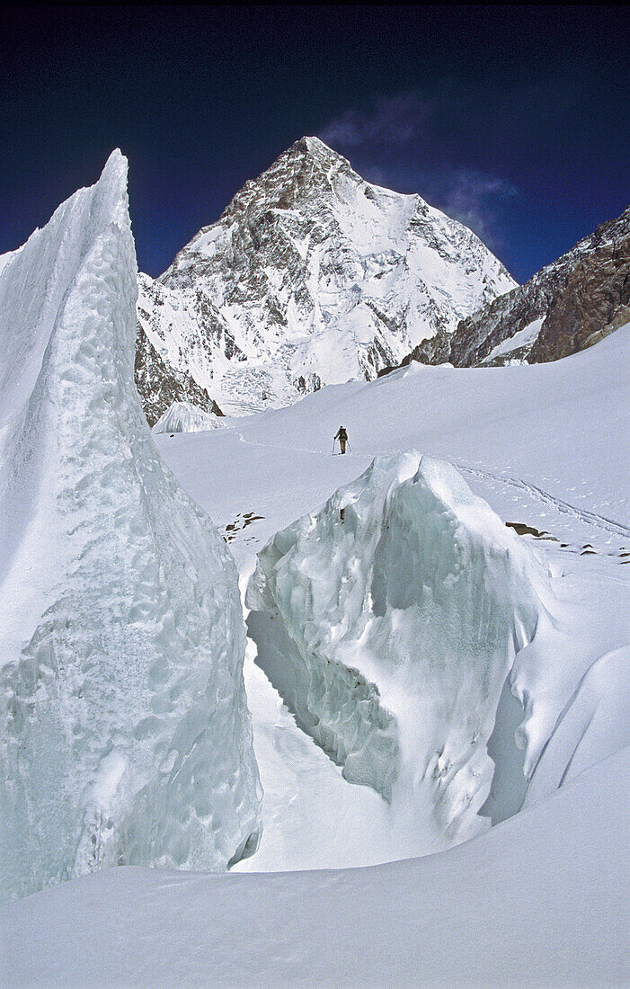 Skiers aproach base of K2, Godwin-Austen glacier in spring. Karakoram mountains, Pakistan