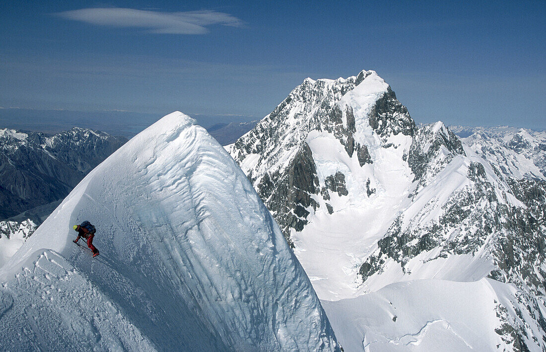 Climber on Mount Tasman. Mount Cook behind. Fox Glacier. Westland National Park. Southern Alps. New Zealand