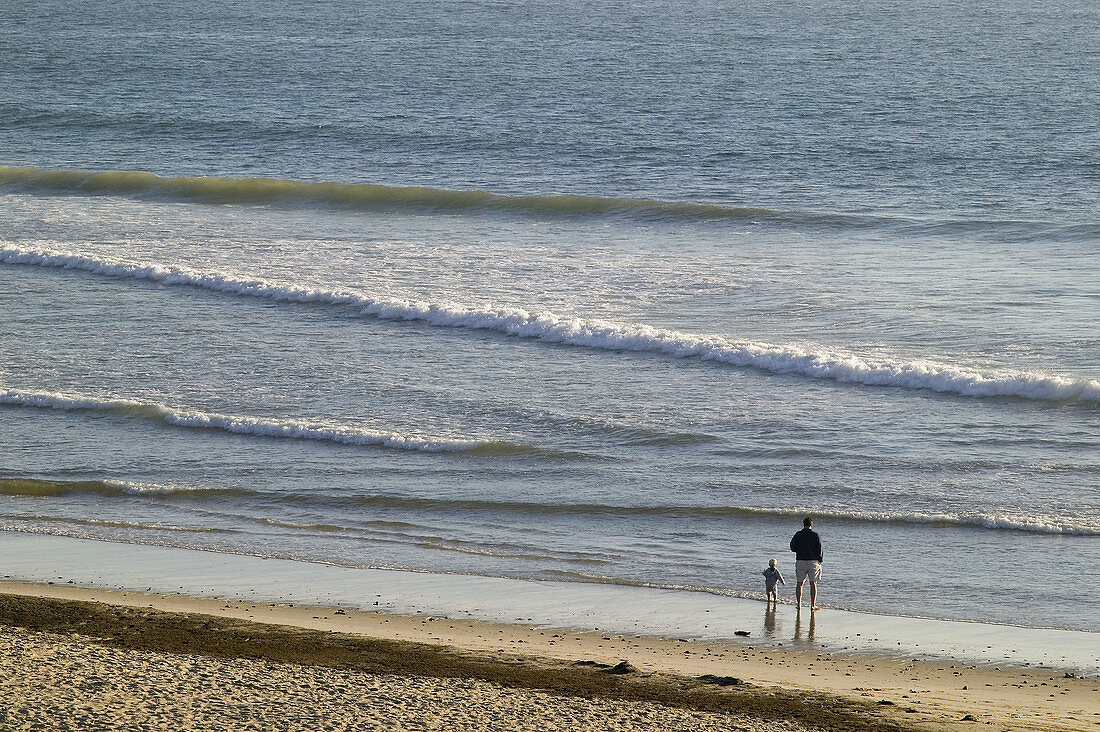 Father and son, Cahoon Hollow beach, Wellfleet, Cape Cod, Massachusetts. USA.