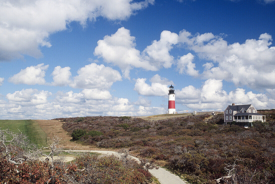 Sankaty Head lighthouse, cumulus clouds, Nantucket, Massachusetts. USA.