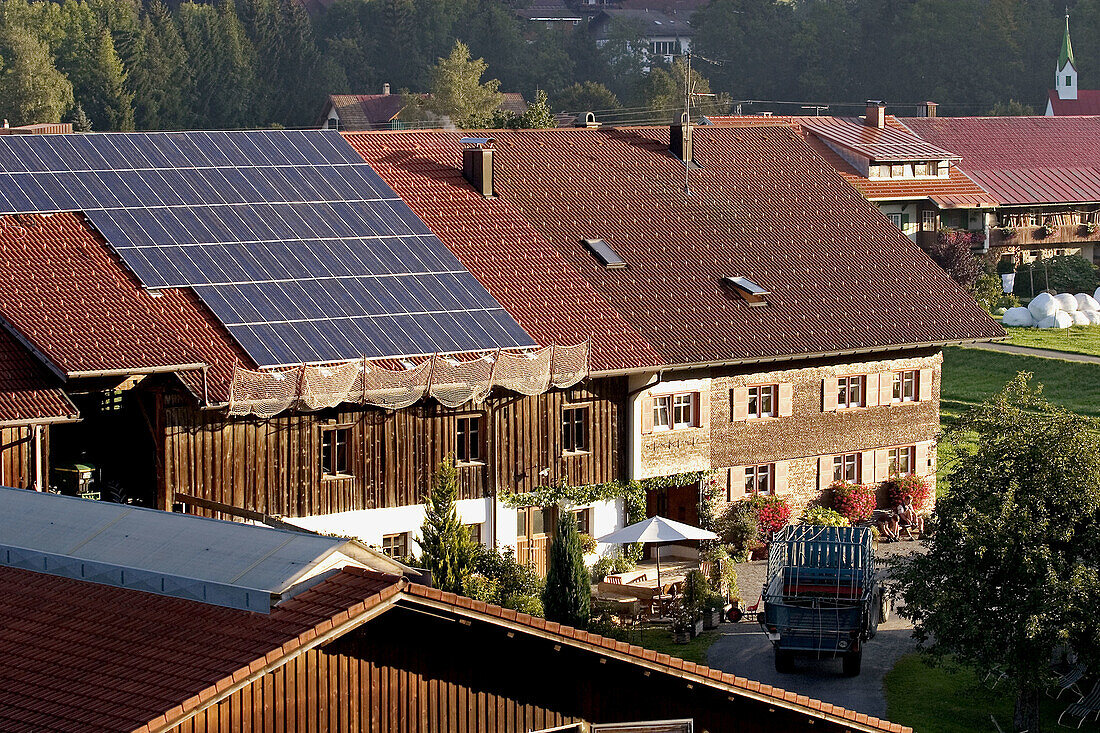 Farm with solar power plant on roof, Oberstaufen, Germany