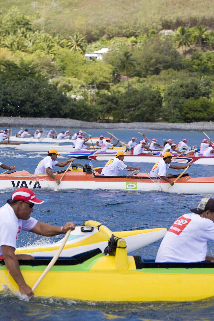 Men in canoos paddling, Ua Pou, Marquesas, Polynesia, Oceania