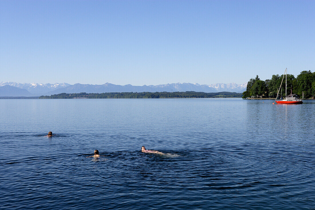 People swimming at Lake Starnberg at Tutzing, Bavaria, Germany