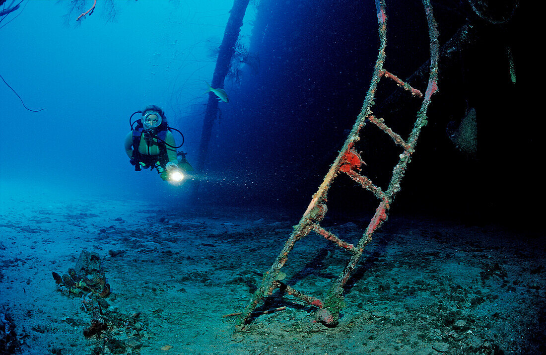 Scuba diver on the Hilma Hooker Ship Wreck, Netherlands Antilles, Bonaire, Caribbean Sea