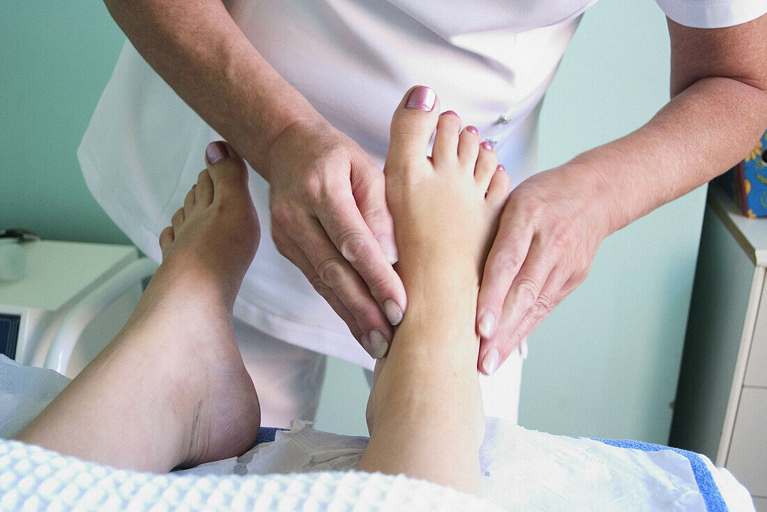Close up of womans feet, having a foot massage