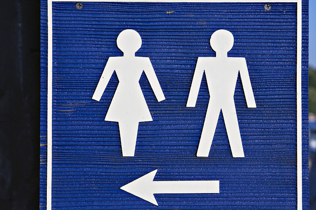 WISCONSIN. Lake Geneva. Arrow to men and womens bathrooms, international icons