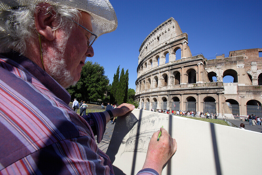 Mature man drawing in front of the Colosseum, Rome, Italy, Europe