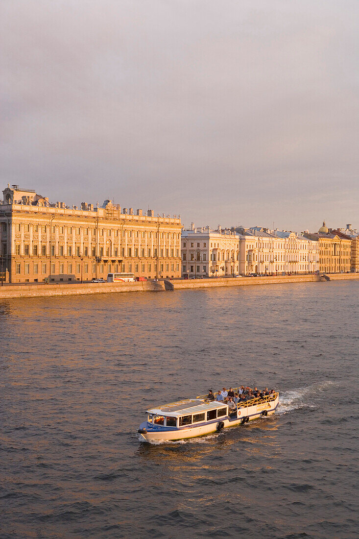 Boat excursion on the river Neva, the palace to the left is the Marble Palace, St. Petersburg, Russia