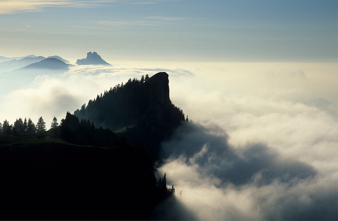 Kampenwand and Hochlerch above fog bank, Chiemgau range, Chiemgau, Upper Bavaria, Bavaria, Germany