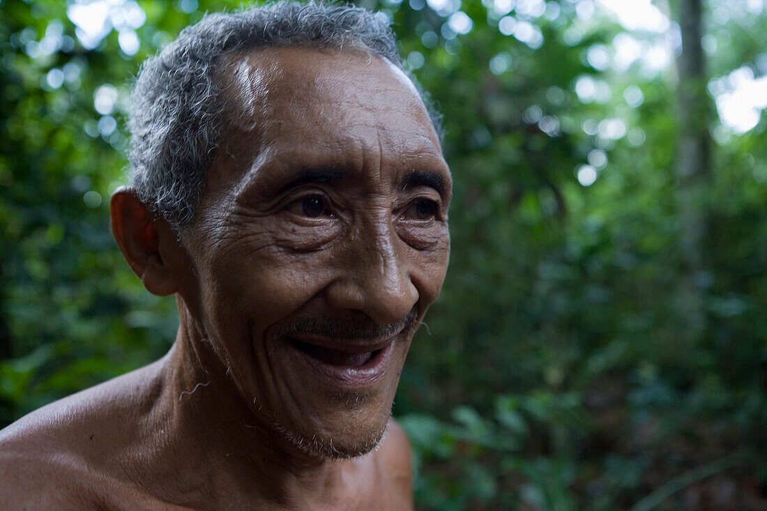 Cheerful Amazonian Man in the rainforest, Combo Island, near Belem, Para, Brazil, South America